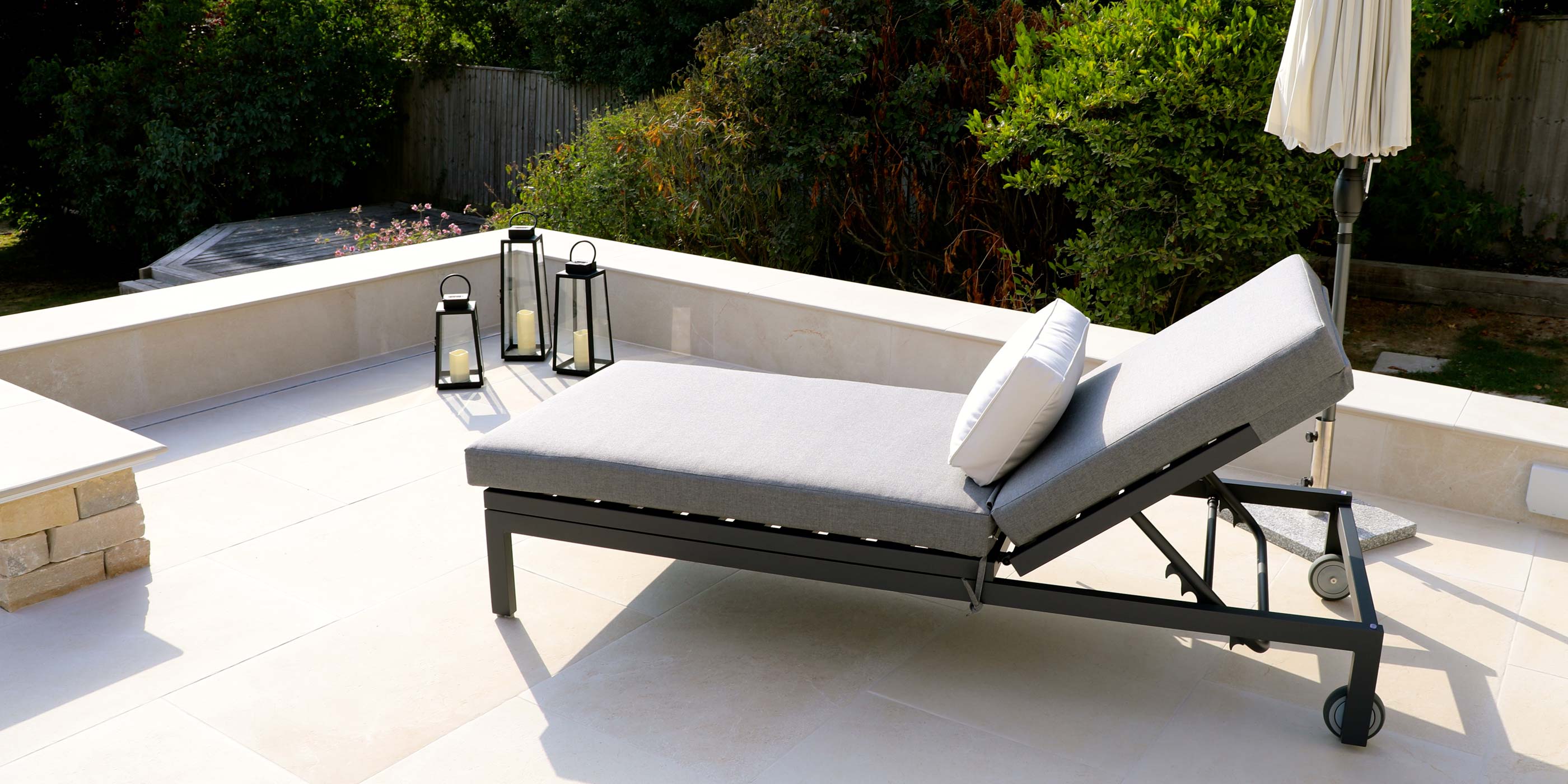 Moderno Sunbrella Fabric Sun Lounger On Balcony | Alexander Francis