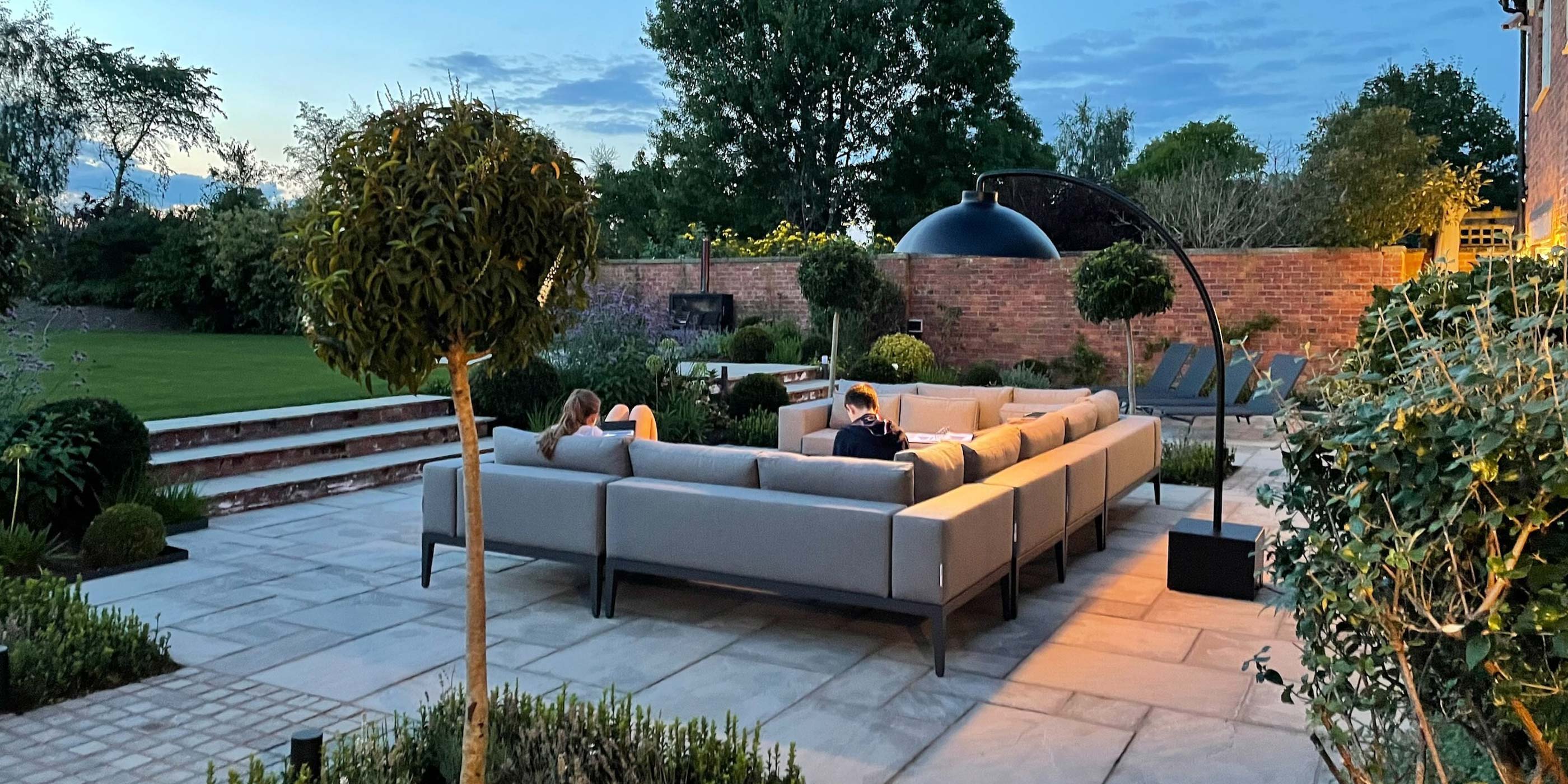 Grey Fabric Outdoor Furniture On A Summers Evening